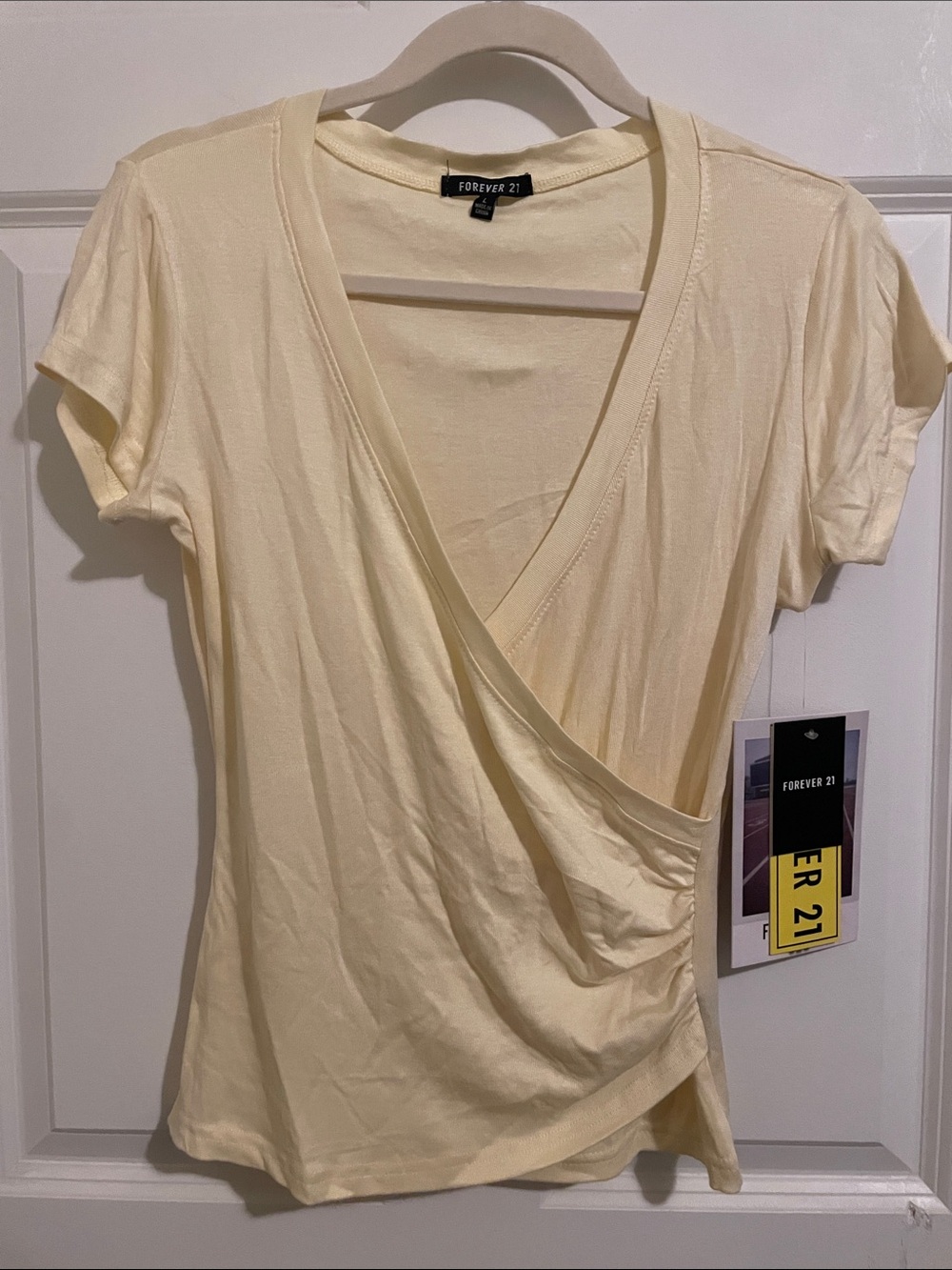 Forever 21 Light soft pastel yellow Surplice Short Sleeve Top